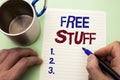Writing note showing Free Stuff. Business photo showcasing Complementary Free of Cost Chargeless Gratis Costless Unpaid written b Royalty Free Stock Photo
