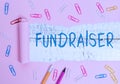 Writing note showing Fundraiser. Business photo showcasing demonstrating whose job or task is seek financial support for