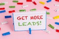 Writing note showing Get More Leads. Business photo showcasing initiation consumer interest or enquiry products or Royalty Free Stock Photo