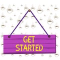 Writing note showing Get Started. Business photo showcasing Begin an important period in one s is life or career Begin a task Wood