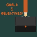Writing note showing Goals And Objectives. Business photo showcasing define strategies or implementation steps attain