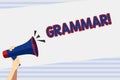 Writing note showing Grammar. Business photo showcasing whole system structure language syntax and morphology Human Hand Royalty Free Stock Photo