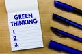 Writing note showing Green Thinking. Business photo showcasing Taking ction to make environmental responsibility a reality