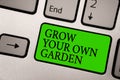 Writing note showing Grow Your Own Garden. Business photo showcasing Organic Gardening collect personal vegetables fruits Silver g Royalty Free Stock Photo