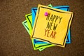 Writing note showing Happy New Year. Business photo showcasing congratulations Merry Xmas everyone beginning of January Papers be