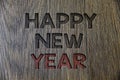 Writing note showing Happy New Year. Business photo showcasing congratulations Merry Xmas everyone beginning of January Wooden wo