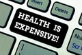 Writing note showing Health Is Expensive. Business photo showcasing take care body eat healthy play sport prevent injury