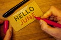 Writing note showing Hello June. Business photos showcasing Starting a new month message May is over Summer startingMan creating