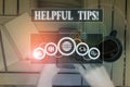 Writing note showing Helpful Tips. Business photo showcasing advices given to be helpful knowledge in life Picture photo network