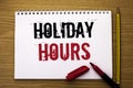 Writing note showing Holiday Hours. Business photo showcasing Celebration Time Seasonal Midnight Sales Extra-Time Opening written Royalty Free Stock Photo