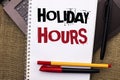 Writing note showing Holiday Hours. Business photo showcasing Celebration Time Seasonal Midnight Sales Extra-Time Opening written Royalty Free Stock Photo