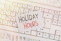 Writing note showing Holiday Hours. Business photo showcasing Schedule 24 or7 Half Day Today Last Minute Late Closing Keyboard