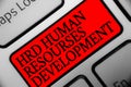 Writing note showing Hrd Human Resources Development. Business photo showcasing helping employees develop personal skills Keyboard