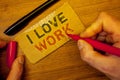 Writing note showing I Love Work. Business photos showcasing To be happy satisfied with job Be doing what you most likeMan creati