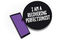 Writing note showing I Am A Recovering Perfectionist. Business photo showcasing Obsessive compulsive disorder recovery Cell phone