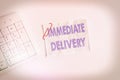 Writing note showing Immediate Delivery. Business photo showcasing Send it Now Custom Procedure to dispose Promptly White pc Royalty Free Stock Photo