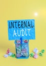 Writing note showing Internal Audit. Business photo showcasing evaluating and improving the effectiveness of risk management Trash Royalty Free Stock Photo