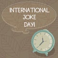 Writing note showing International Joke Day. Business photo showcasing holiday to celebrate the benefit of good humor