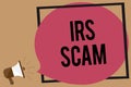 Writing note showing Irs Scam. Business photo showcasing targeted taxpayers by pretending to be Internal Revenue Service Megaphone