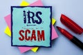 Writing note showing Irs Scam. Business photo showcasing Warning Scam Fraud Tax Pishing Spam Money Revenue Alert Scheme written o Royalty Free Stock Photo