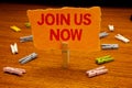 Writing note showing Join Us Now. Business photo showcasing enroll community register website Recruit someone Sign-up Paperclip h