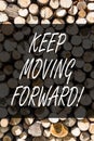 Writing note showing Keep Moving Forward. Business photo showcasing Optimism Progress Persevere Move Wooden background