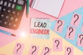 Writing note showing Lead Engineer. Business photo showcasing control his team and manage phases of the project in hand Royalty Free Stock Photo
