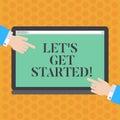 Writing note showing Let S Is Get Started. Business photo showcasing encourage demonstrating or group to begin doing Royalty Free Stock Photo