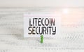 Writing note showing Litecoin Security. Business photo showcasing peertopeer cryptocurrency and opensource software Green Royalty Free Stock Photo