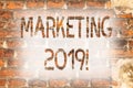 Writing note showing Marketing 2019. Business photo showcasing New Year Market Strategies Fresh start Advertising Ideas Brick Wall Royalty Free Stock Photo