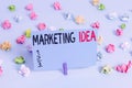 Writing note showing Marketing Idea. Business photo showcasing activities that seek to gain market share for a concept Colored