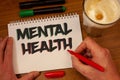 Writing note showing Mental Health. Business photos showcasing Psychological and Emotional Condition Wellbeing of a person Royalty Free Stock Photo