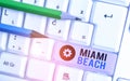 Writing note showing Miami Beach. Business photo showcasing the coastal resort city in MiamiDade County of Florida.