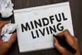 Writing note showing Mindful Living. Business photo showcasing Fully aware and engaged on something Conscious and Sensible Man hol