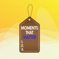 Writing note showing Moments That Matter. Business photo showcasing Meaningful positive happy memorable important times Empty tag Royalty Free Stock Photo