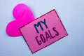 Writing note showing My Goals. Business photo showcasing Goal Aim Strategy Determination Career Plan Objective Target Vision writ Royalty Free Stock Photo