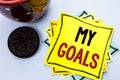 Writing note showing My Goals. Business photo showcasing Goal Aim Strategy Determination Career Plan Objective Target Vision writ Royalty Free Stock Photo