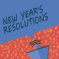 Writing note showing New Year s is Resolutions. Business photo showcasing Wishlist List of things to accomplish or improve