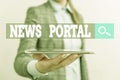 Writing note showing News Portal. Business photo showcasing designed website that brings information from diverse Royalty Free Stock Photo