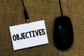 Writing note showing Objectives. Business photo showcasing Goals planned to be achieved Desired targets Company missions Sticky ca Royalty Free Stock Photo