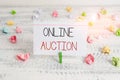 Writing note showing Online Auction. Business photo showcasing process of buying and selling goods or services online Green