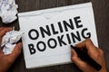 Writing note showing Online Booking. Business photo showcasing Reservation through internet Hotel accommodation Plane ticket Man h Royalty Free Stock Photo