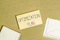 Writing note showing Optimization Plan. Business photo showcasing Finding an alternative with the most cost effective Cardboard