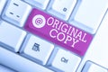 Writing note showing Original Copy. Business photo showcasing Main Script Unprinted Branded Patented Master List White pc keyboard Royalty Free Stock Photo