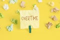 Writing note showing Overtime. Business photo showcasing Time or hours worked in addition to regular working hours Colored Royalty Free Stock Photo