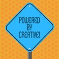 Writing note showing Powered By Creative. Business photo showcasing characterized by originality of thought or Royalty Free Stock Photo