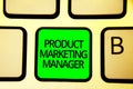 Writing note showing Product Marketing Manager. Business photo showcasing who responsible for putting plan to sell product Keyboar Royalty Free Stock Photo