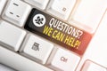 Writing note showing Questionsquestion We Can Help. Business photo showcasing offering help to those who wants to know Royalty Free Stock Photo