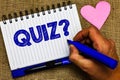 Writing note showing Quiz Question. Business photo showcasing Short Tests Evaluation Examination to quantify your knowledge Notepa Royalty Free Stock Photo