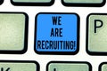 Writing note showing We Are Recruiting. Business photo showcasing get someone to join something like community or job Keyboard key Royalty Free Stock Photo